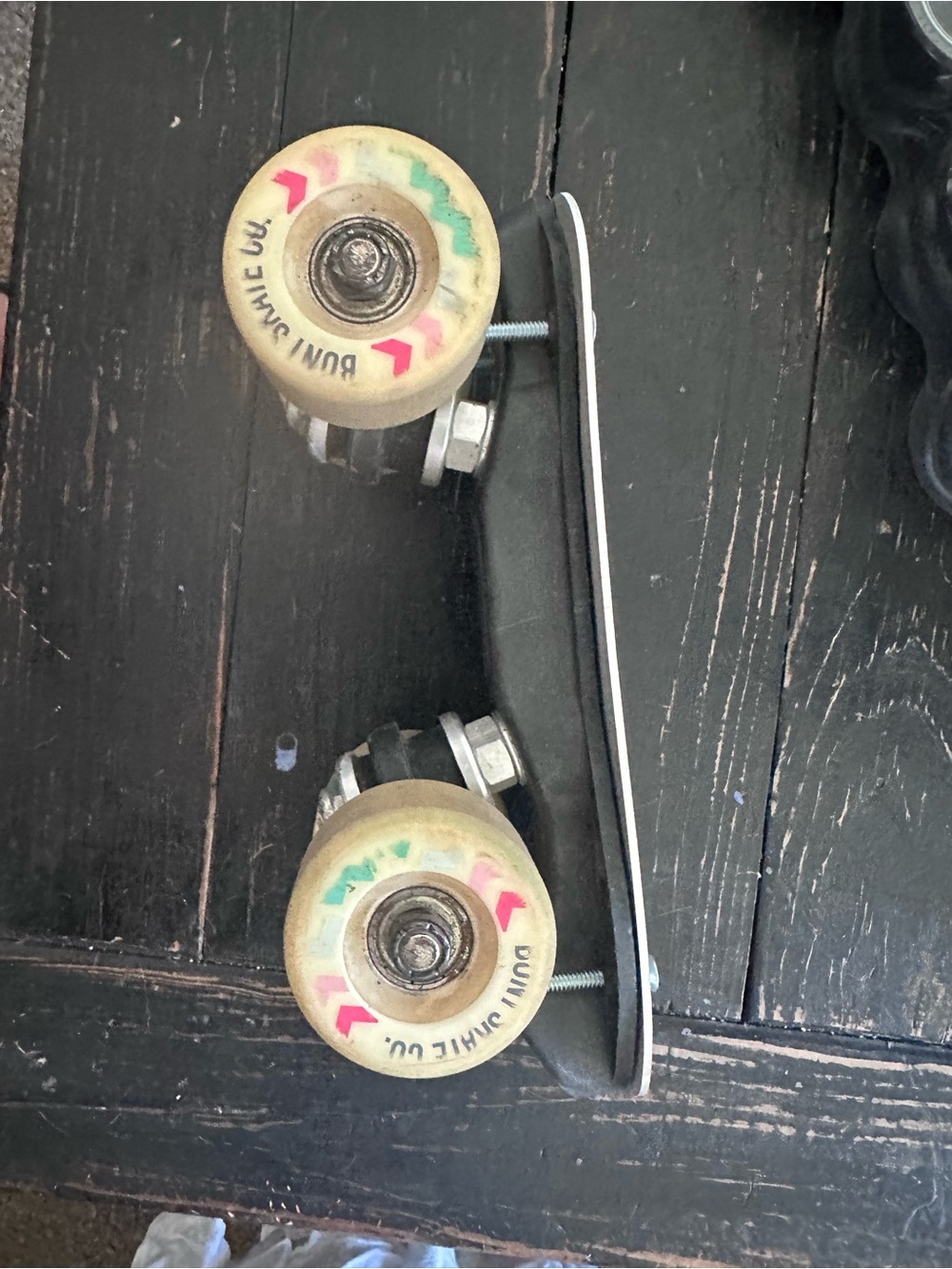 Black Bont Women's Roller Skate pair Trucks, Plate with Cream Wheels